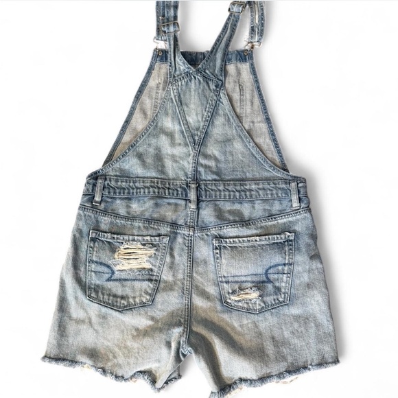 Women’s American Eagle Distressed Denim Overalls. Medium - Picture 2 of 5